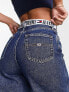 Фото #9 товара Tommy Jeans high rise wide leg jeans in mid wash