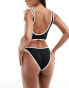 Фото #6 товара ASOS DESIGN mix and match contrast binding high leg hipster bikini bottom in black