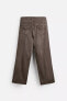 STITCHED WASHED-EFFECT TROUSERS