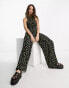 Фото #2 товара Reclaimed Vintage sleeveless jumpsuit in black floral