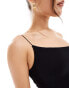 Фото #2 товара ASOS DESIGN asymmetric neck crop top with skinny strap in black