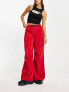 ASOS DESIGN parachute cargo trouser with belt detail in techy fabric in red