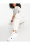 Фото #1 товара Брюки женские утепленные Nike Sportswear Swoosh Fleece oversize кремовые