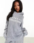 Фото #2 товара ASOS DESIGN Weekend Collective co-ord oversized hoodie with bleach logo in charcoal acid wash