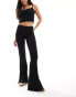 Фото #1 товара Bershka high waisted jersey flared trousers in black