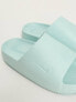 Nike Calm sliders in jade ice blue