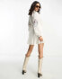 Reclaimed Vintage limited edition mini dress in white with cross stich embroidery