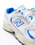 New Balance 530 trainers in white and metallic blue