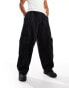 Фото #1 товара ASOS DESIGN oversized balloon jeans with cargo pockets in black with contrast stitch