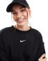 Nike mini swoosh oversized crew sweatshirt in black and sail