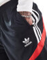 adidas Originals Street shorts in black and red