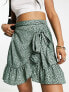 Фото #1 товара Only ruffle wrap mini skirt in green spot