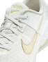 Nike Training Zoom Bella 6 premium trainers in white and gold