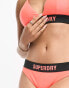 Superdry co-ord elastic bikini brief in hyper fire coral/black