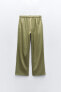 Palazzo trousers with shiny fabric