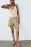 CARGO BERMUDA SHORTS WITH SIDE TABS