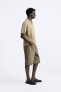 Фото #7 товара Джинсовые шорты с принтом с эффектом потертости ZARA