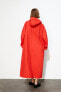 Extra-long rubberised raincoat