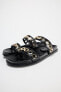 Flat slider sandals with appliqués