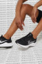 Фото #1 товара Кроссовки беговые женские Nike Downshifter 11 черно-белые
