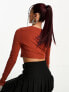 Nike Dance long sleeve crop top in rugged orange