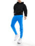 Фото #1 товара Nike Tech Fleece joggers in blue