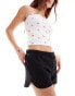 Фото #2 товара Monki heavy jersey shorts with curved hem in black