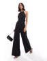 ASOS DESIGN halter tie up back jumpsuit in black and white stripe