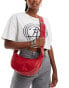 My Accessories faux leather chunky buckle sling bag in red