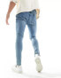 ASOS DESIGN spray on jeans with power stretch in tinted wash blue