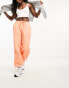 Фото #1 товара ASOS DESIGN parachute cargo trouser with seam detail in washed coral