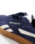 Reebok Club C Grounds trainers in navy with gum sole