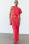 Asymmetric crepe jumpsuit with buckle