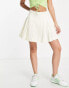 Фото #1 товара Urban Revivo pleated mini skirt in white