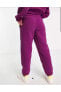 Фото #4 товара Брюки спортивные женские Nike Therma-FIT Cozy Core фиолетовые