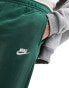 Nike Club straight fit joggers in green