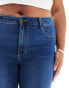 ONLY Curve Augusta high waisted skinny jeans in mid blue wash