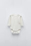 5-PACK OF DANDELION BODYSUITS