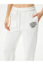 Фото #5 товара Спортивные брюки Koton Jogger с поясом, с карманами, с принтом