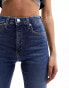 Фото #8 товара Calvin Klein Jeans high rise skinny jeans in mid wash