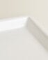 White earthenware bathroom tray