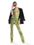 ASOS DESIGN slim leg cut out detail jumpsuit in neon green snake print