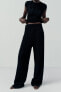 Flowing textured voluminous trousers
