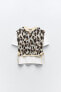 Animal print overlaid vest and top with bows