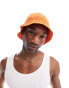 Фото #1 товара ASOS DESIGN knitted bucket hat in orange