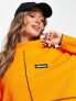 ellesse – Sweatshirt in Orange mit Kontrastnaht