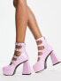 Lamoda True Romance multi buckle platform shoes in pink patent