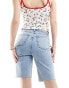 ONLY Emily mid rise raw hem longline denim short in light blue wash