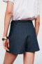 Skort with slits and belt