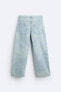 Laser-cut faded baggy jeans